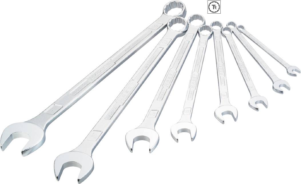 Set of seven chrome-plated spanners in various sizes, arranged from large to small on a white surface.