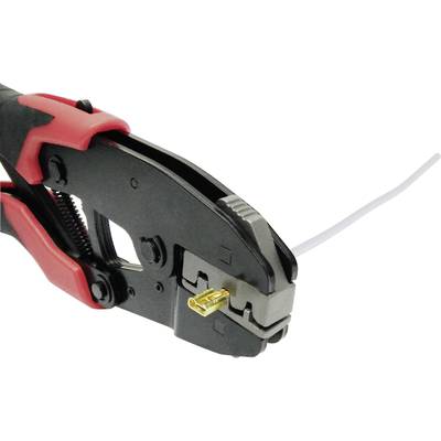 A crimping plier with a cable in its jaws, ready to crimp a connector. The pliers have red and black handles.