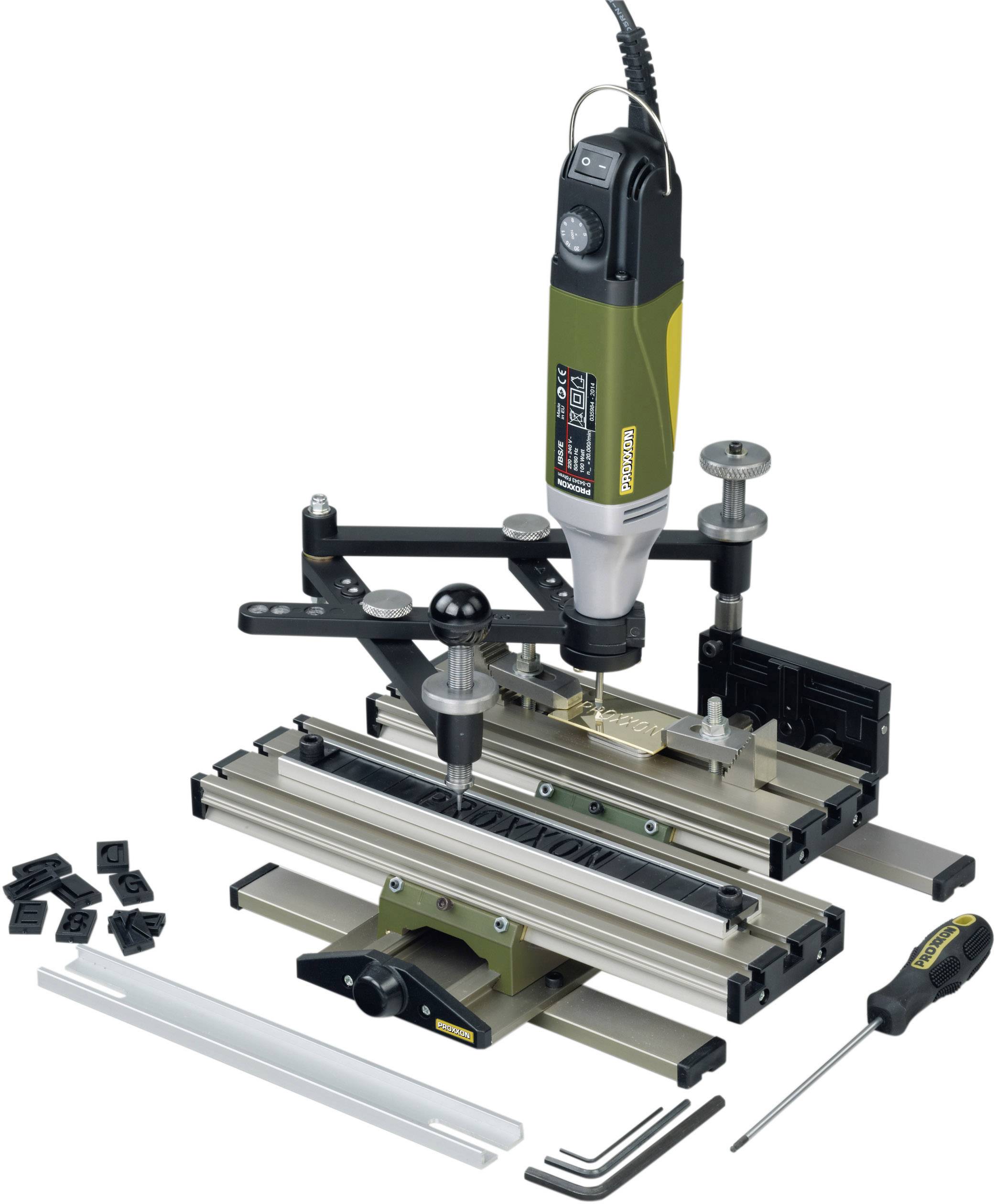 Router with router table, screwdriver and Allen keys. Suitable for precise drilling and milling work in workshops.