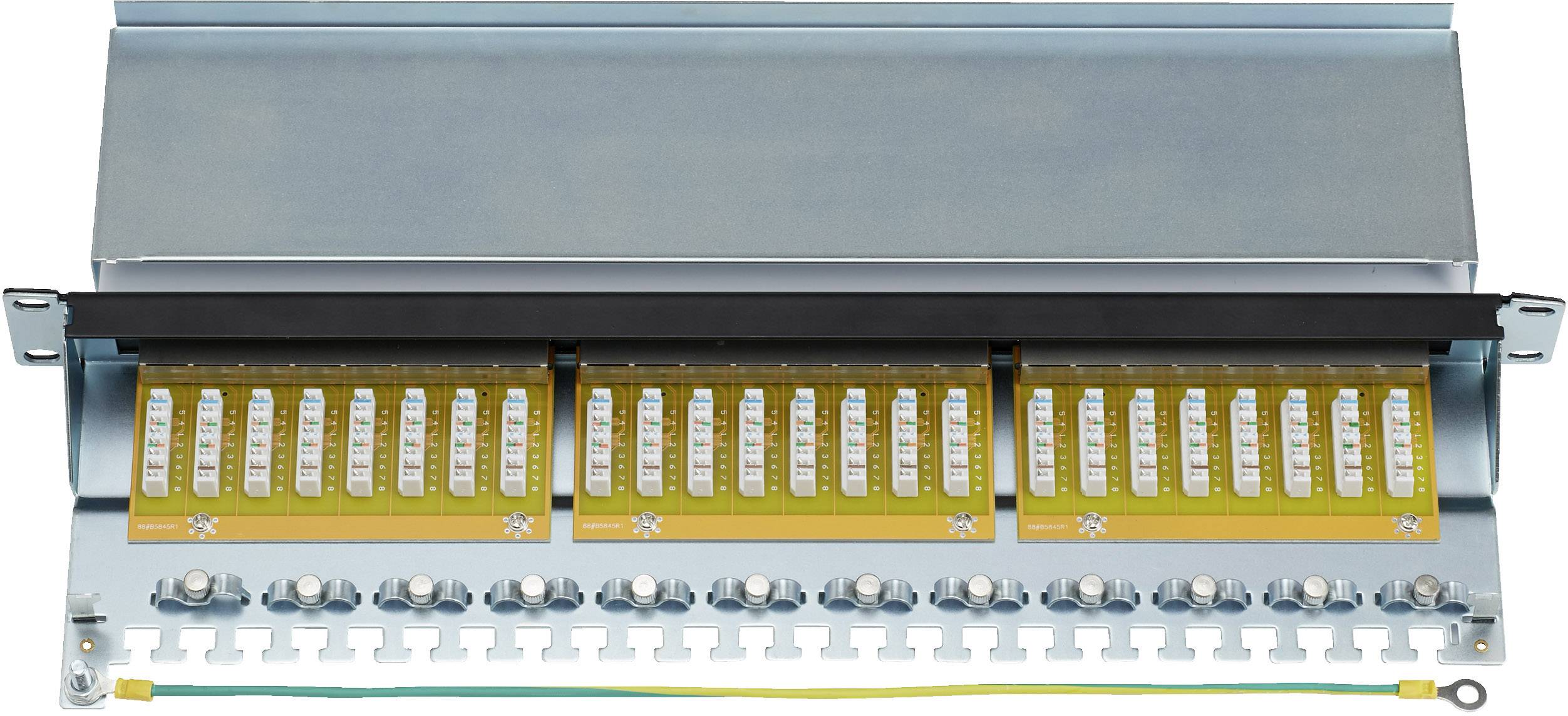 A metal enclosure showing 24 optical fibre cable connections, evenly distributed in two rows, with an earth terminal at the bottom.