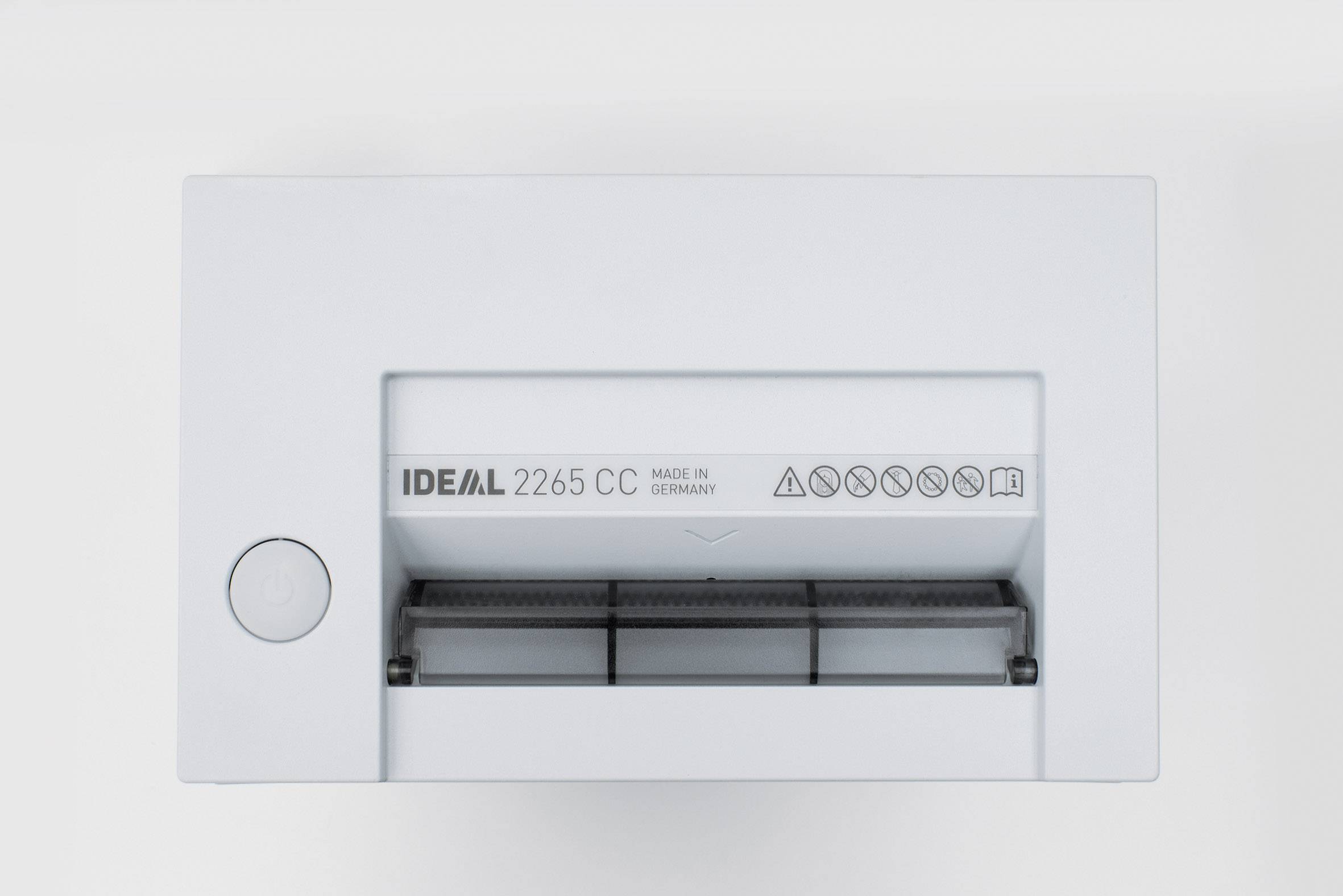 Paper shredder viewed from above with the label 'IDEAL 2265 CC'. Contains symbols for safety and operational information.