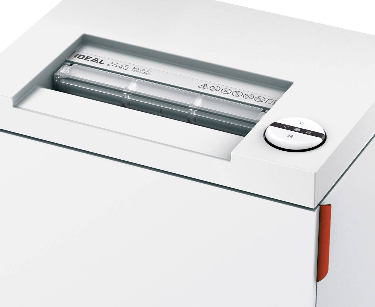 A grey paper shredder with the text 'IDEAL 2445' printed on it. The feed slot and a round switch are visible on the top surface.