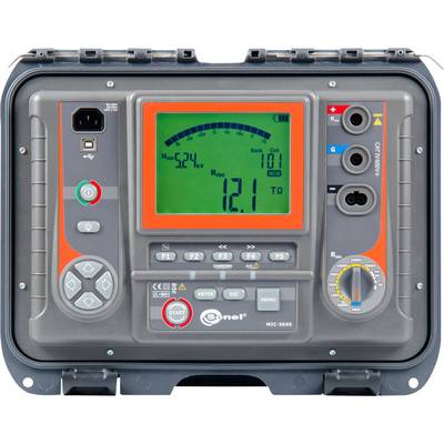 A digital measuring instrument with a display shows '524V'. It has buttons and connections for measuring electrical parameters.
