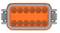 Orange and grey rectangular plug with ten round socket slots, symmetrically arranged.