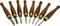 Set of seven wood carving tools with brown wooden handles and brass fittings, showing various blade shapes.