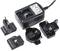Black power adapter with multiple interchangeable plugs for different socket types. Ideal for travelling in various countries.