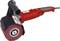 Red band sander with handle, red casing and coarse abrasive disc. Used for smoothing surfaces and removing material.
