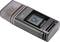 A digital breathalyser displays the reading '0.52' on its screen. The device is compact and easy to handle.