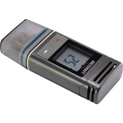 A digital moisture metre shows the value '52' on the display. It has a compact, grey casing with a transparent protective cover.