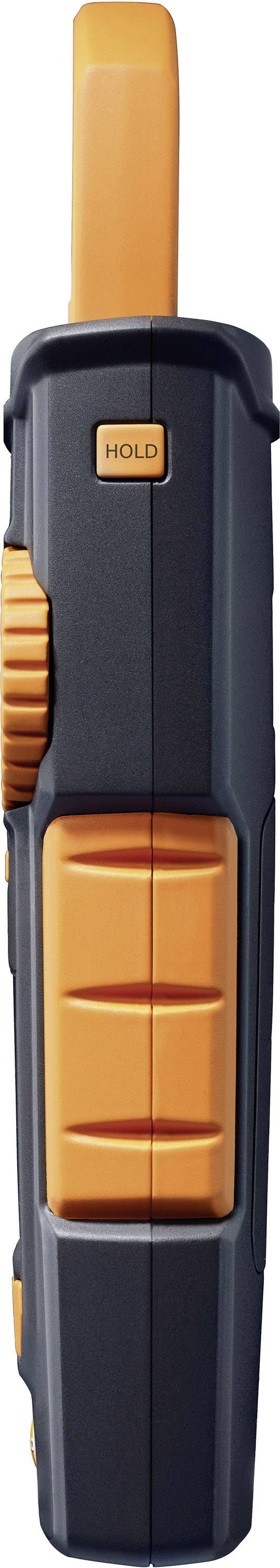 A walkie-talkie viewed from the side, black with orange accents, clearly shows the 'Hold' button.