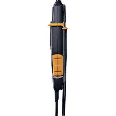 The image shows a side view of a black device with orange buttons, likely an electronic control unit or tool.
