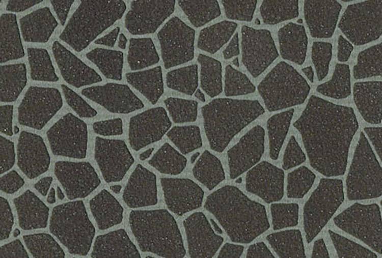 Irregular, geometric pattern with dark grey shapes on a light grey background.