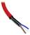 Red, insulated electrical cable with exposed blue and brown wire ends, isolated, on a white background.