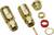 Two golden coaxial plugs and various individual parts such as nuts and rings required for installation.