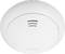 Round smoke detector on the ceiling, white, with ventilation slots and the 'ABUS' logo on the underside, for fire protection monitoring.