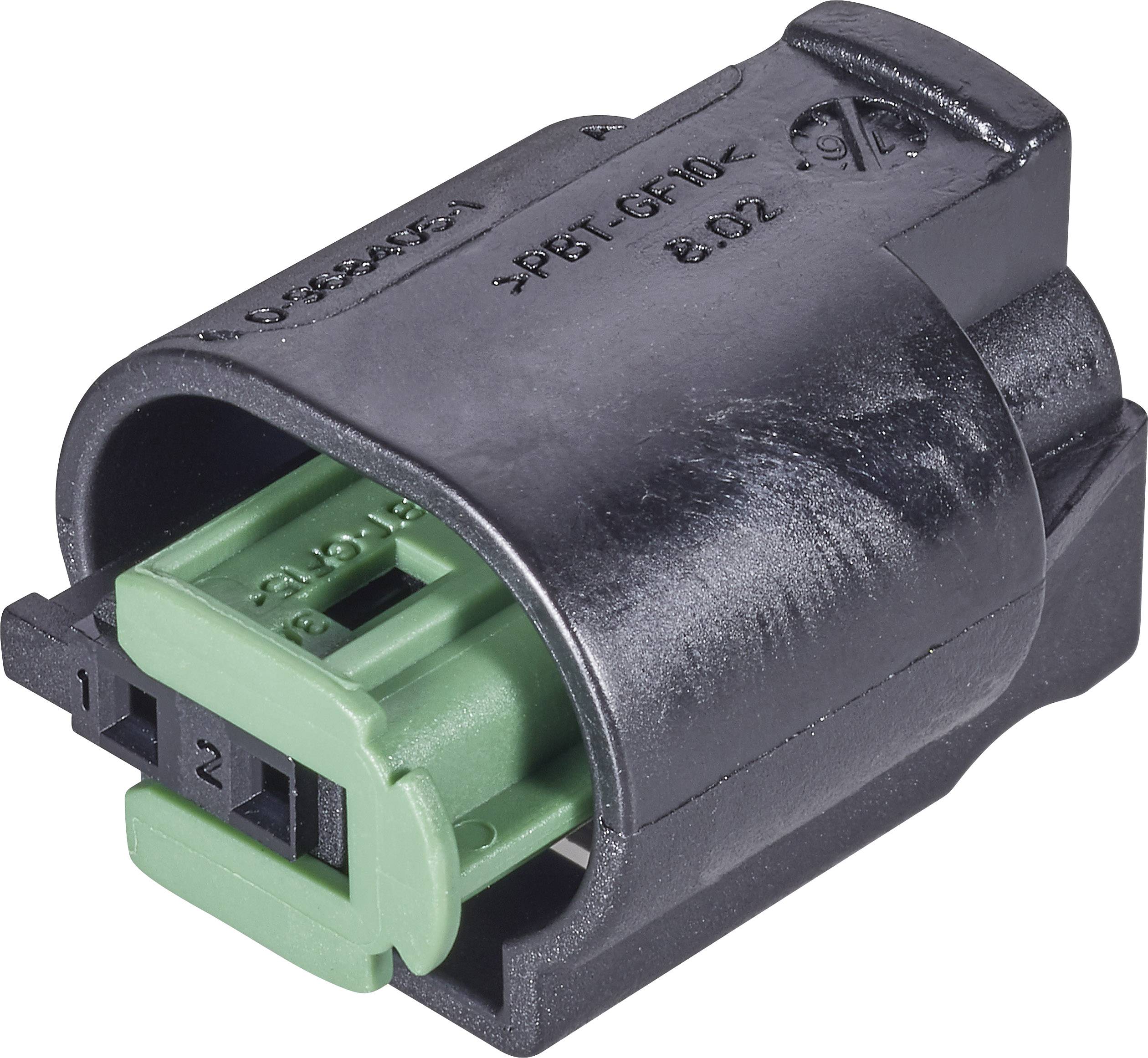 A black plastic connector housing with a green connector inside, identifiable by its rectangular shape and two visible pins.