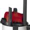 Vacuum cleaner with a red casing and various attachments.