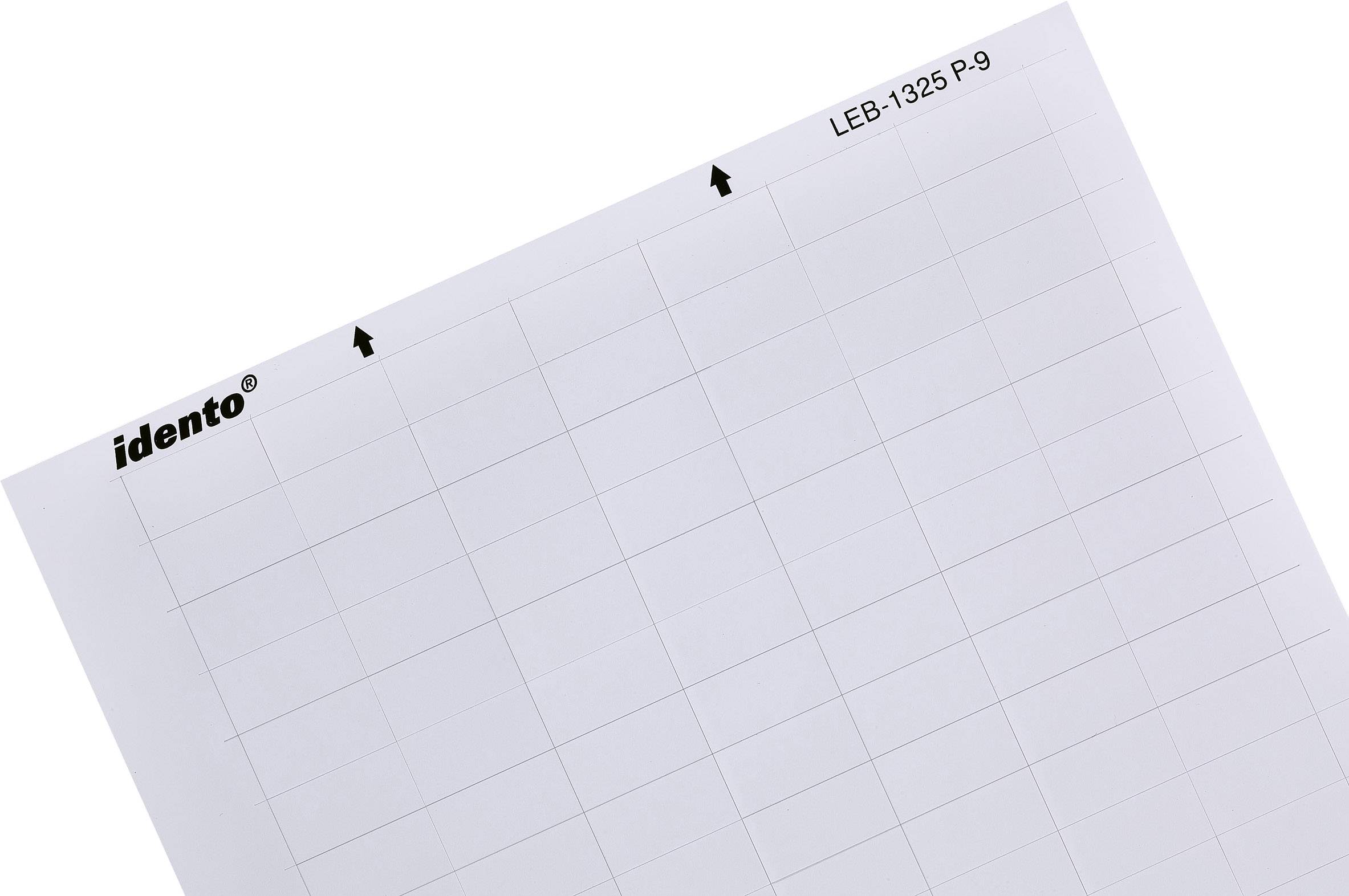 Paper sheet with grid lines and 'idento LEB-1325 P-9' text in the corner. Printed arrows pointing in opposite directions.