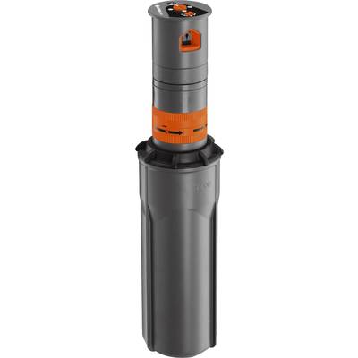 Sprinkler head with a grey housing and orange details; demonstrates adjustment mechanisms for controlling water distribution.