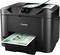 Dark multifunction printer prints colourful diagrams and tables. Brand name visible. Documents are output from the top and front.