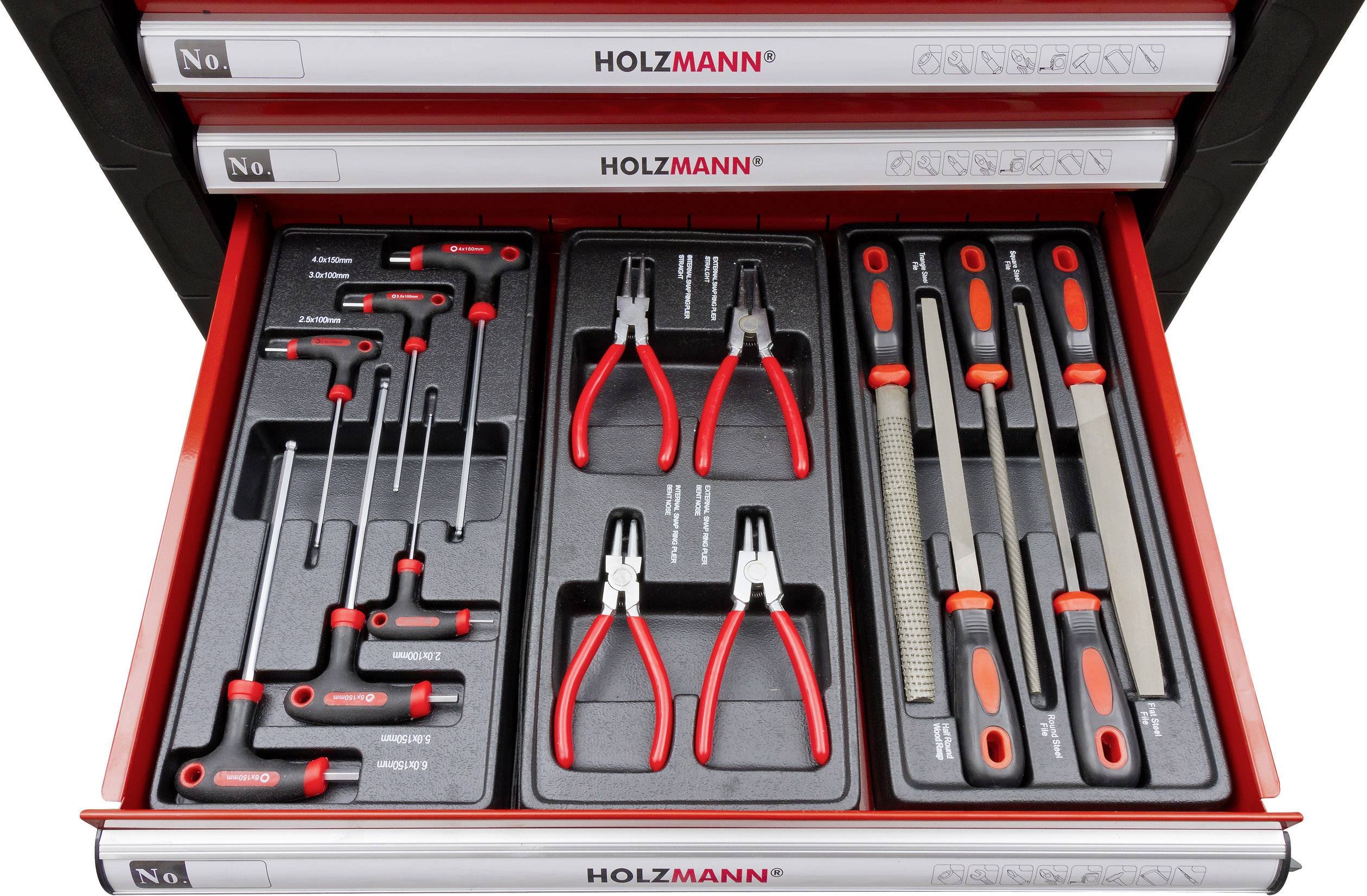 'Set of tools in a drawer: screwdrivers, pliers and files, neatly arranged. Labelled with "Holzmann".'