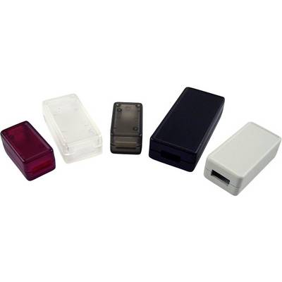Five small plastic enclosures in various colours: red, clear, smoke grey, black and white, lying side by side.