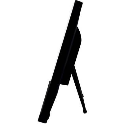 Side view of a black tablet with stand, positioned on a table.