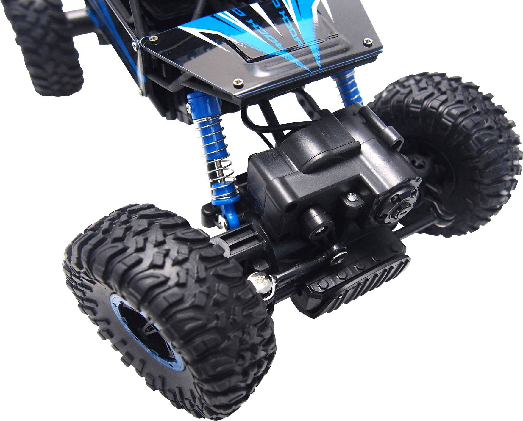 A remote-controlled car with large, all-terrain tyres and blue shock absorbers, photographed from the front.