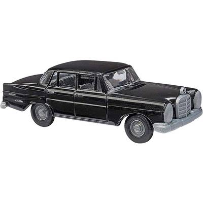 Black model car of a classic four-door vehicle, pictured from the side, in the style of an older Mercedes-Benz.