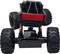 A remote-controlled car with large tyres and a red rear drives over rough terrain.