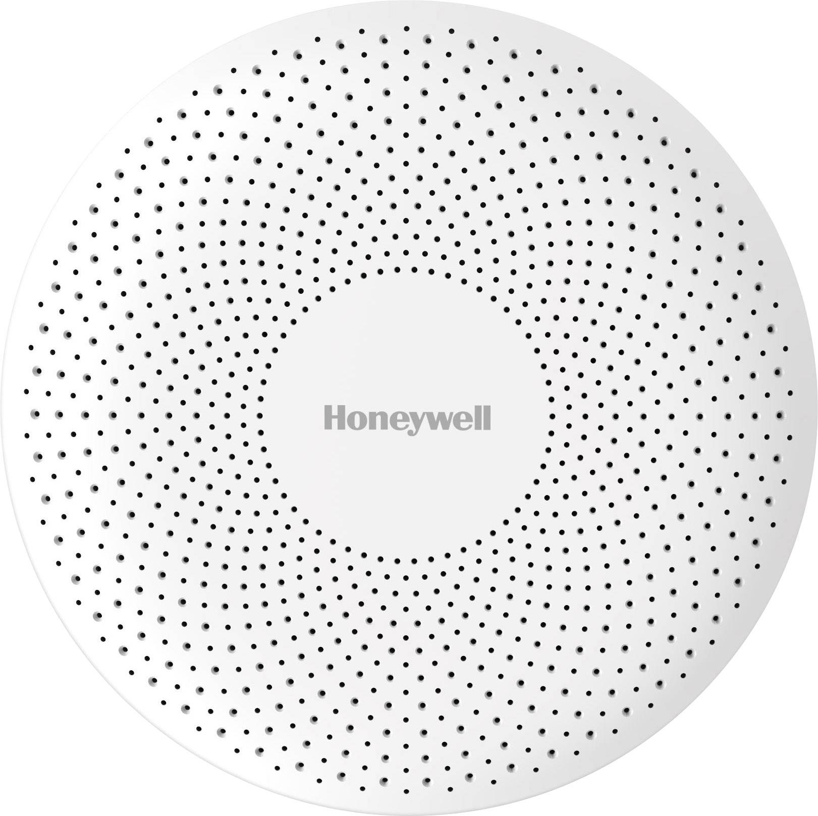 Round, white smoke detector with numerous small holes and the 'Honeywell' text in the centre.