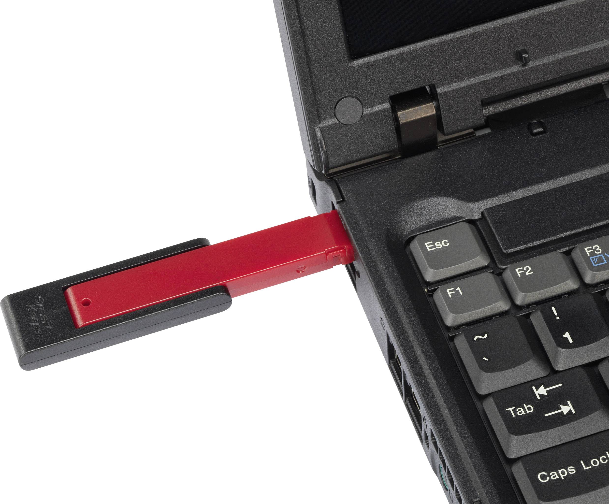 A red USB stick is plugged into the USB port of a black laptop. The laptop displays a partially open view.