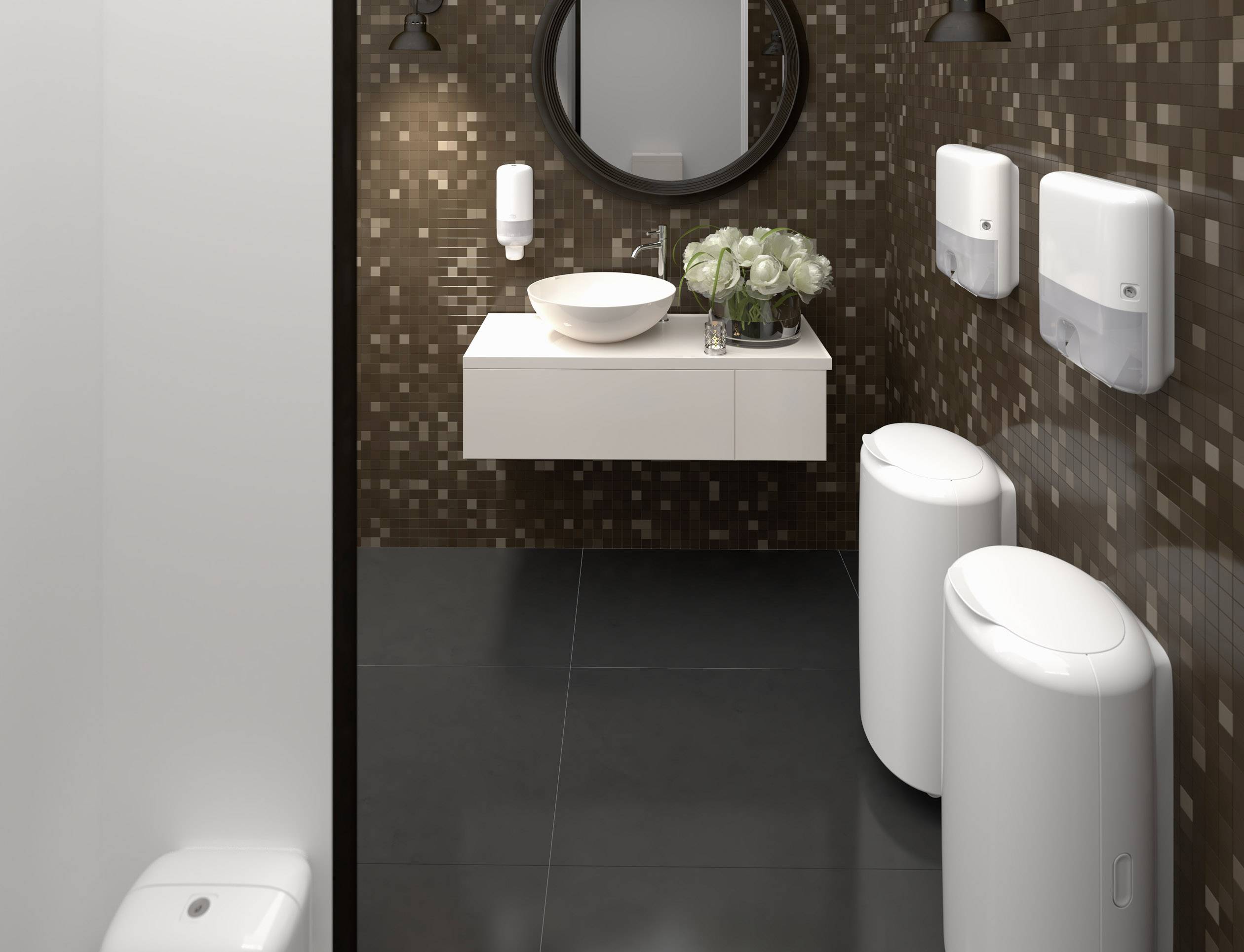 A modern bathroom with a wall mirror and a round basin on a floating vanity, surrounded by soap dispensers.