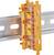An orange, transparent WAGO-221 DIN rail adapter is attached to a metal rail. It holds four orange push-in terminals.