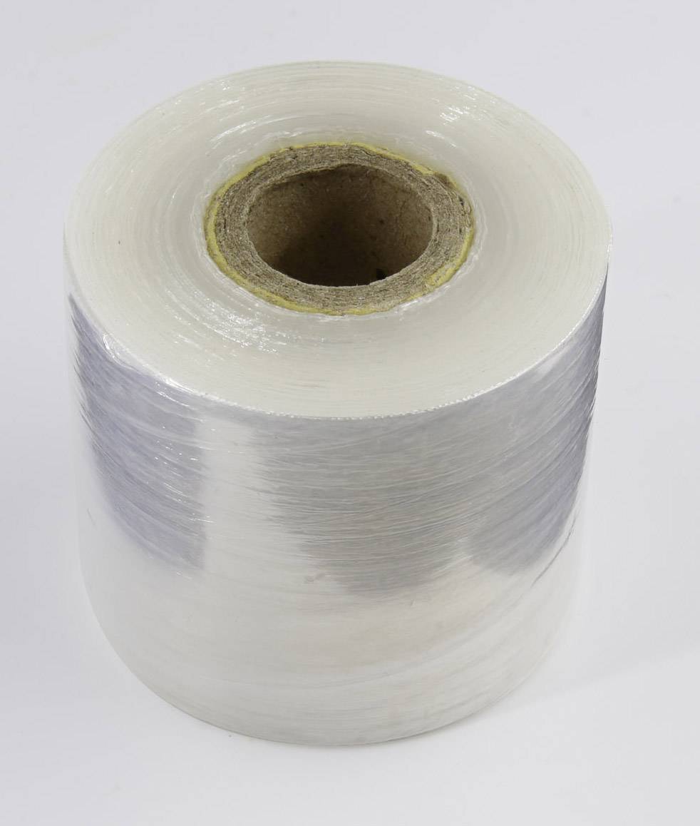 A roll of transparent plastic film on a light background.