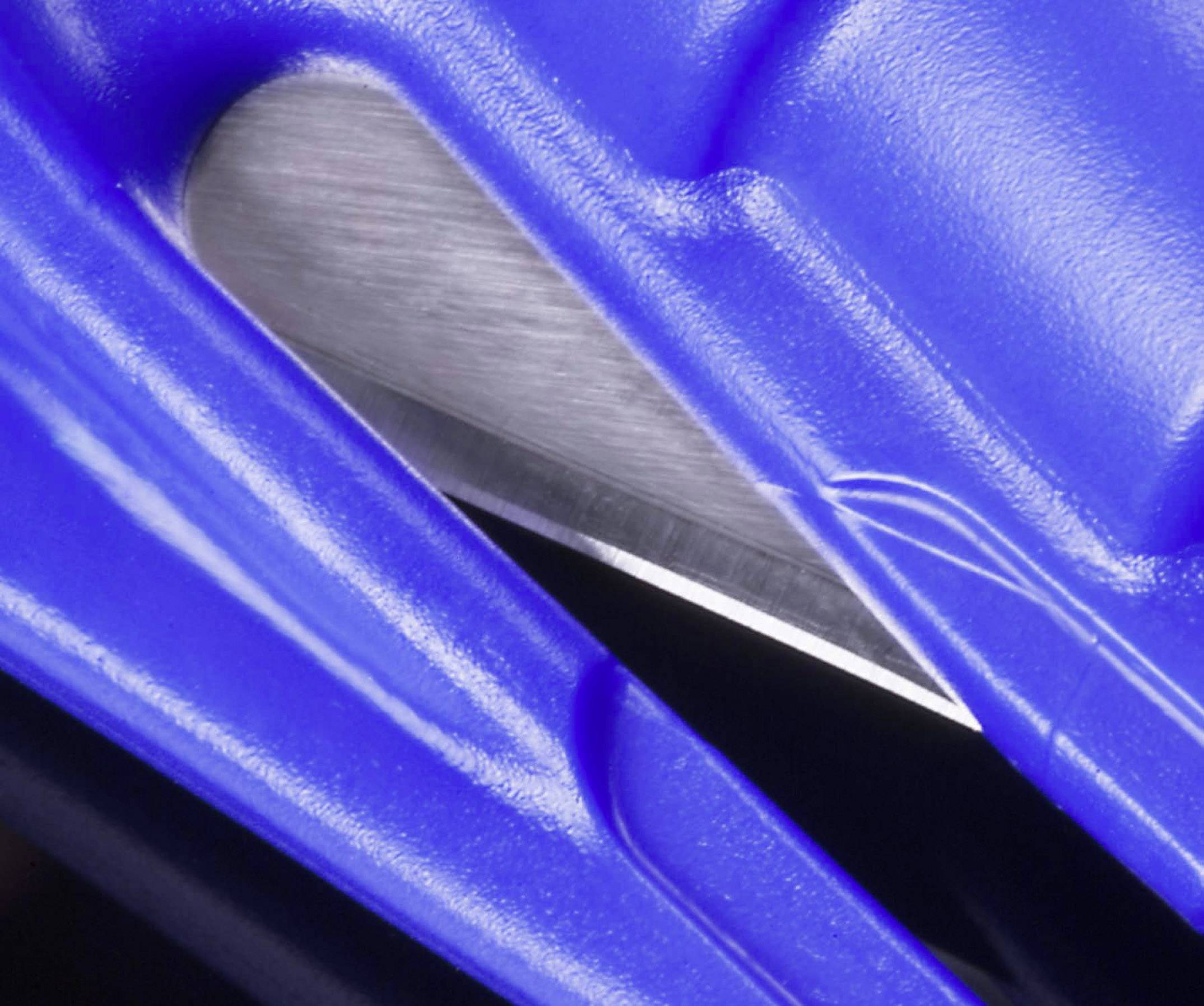 Close-up of a sharp knife in a blue plastic packaging.