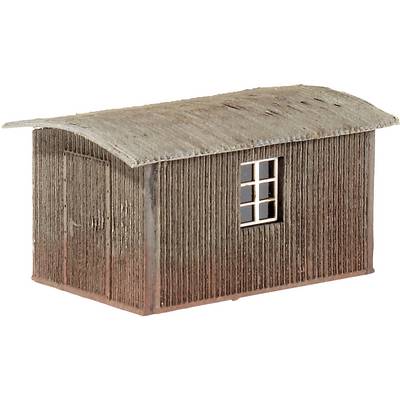Small wooden shed with corrugated metal roof and one window.