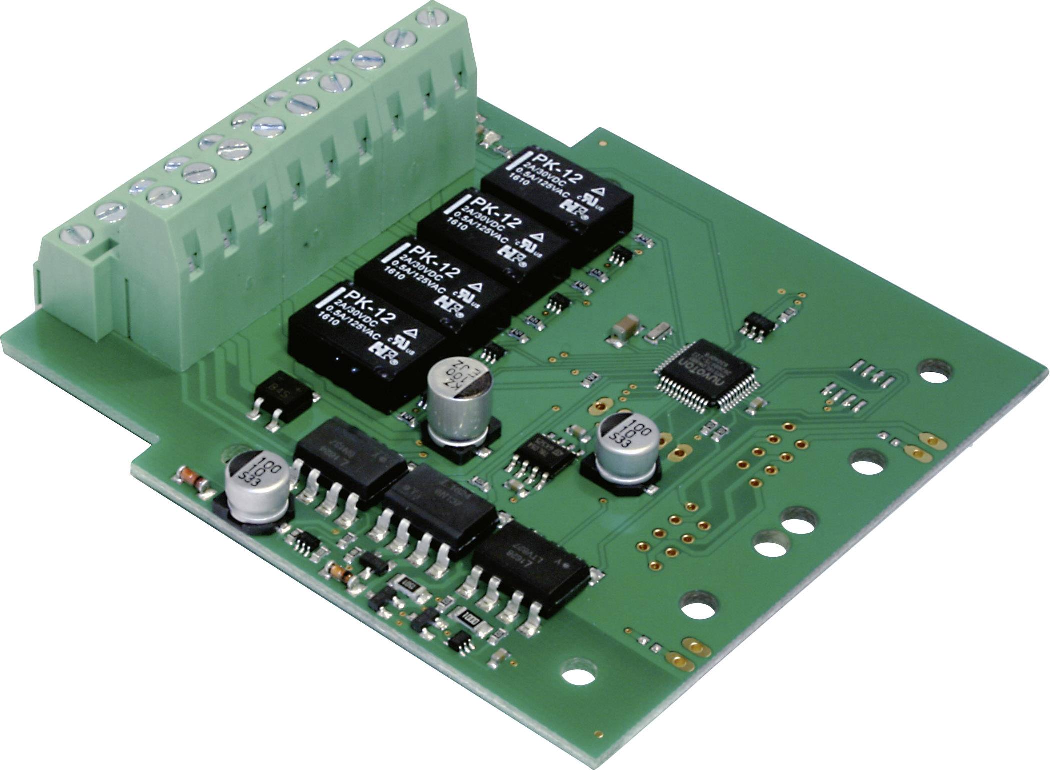 A green printed circuit board with multiple black integrated circuits, capacitors, and a green terminal block for electrical connections.