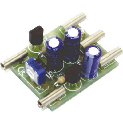 A green circuit board with blue and black capacitors, metal pins, and an adjustable blue resistor in the centre.