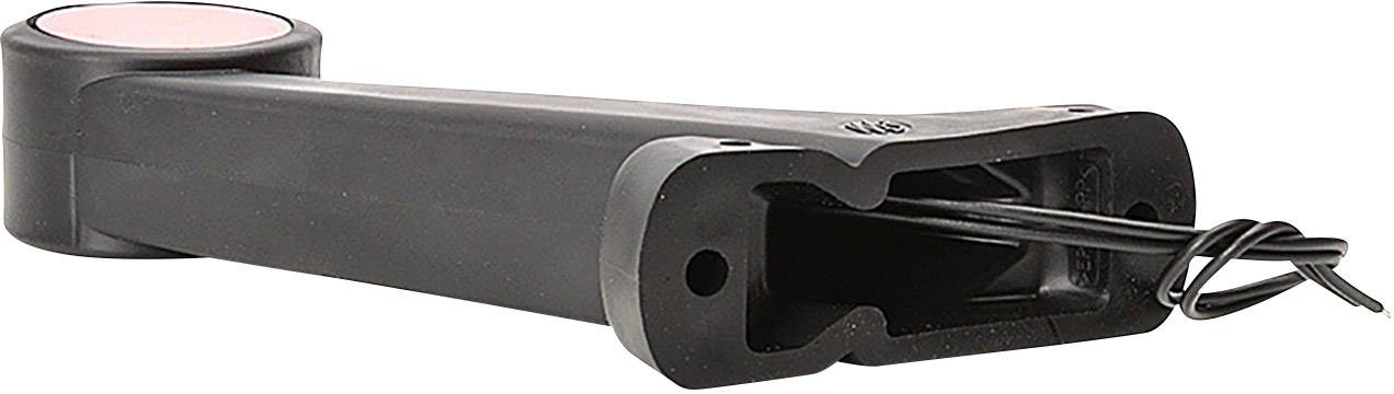 Black plastic handle with integrated cable storage, laid flat. Cable is plugged into the handle.