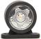 A round LED light in a black housing displays a star-shaped pattern within the interior of the lens. It stands on a flat base.