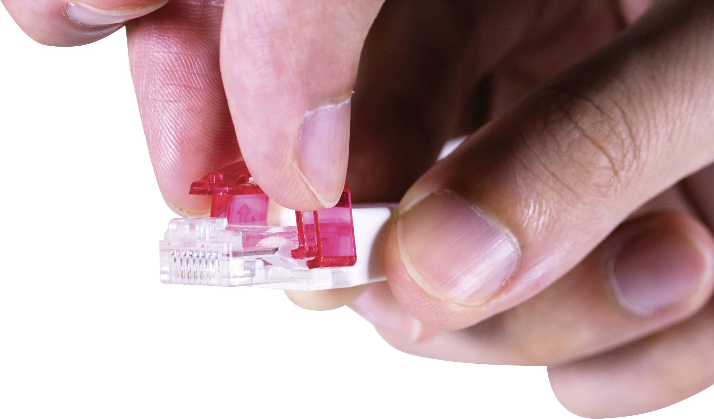 'Close-up of hands holding a red and white network cable plug.'