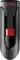 A black SanDisk USB drive with a red switch in the middle.