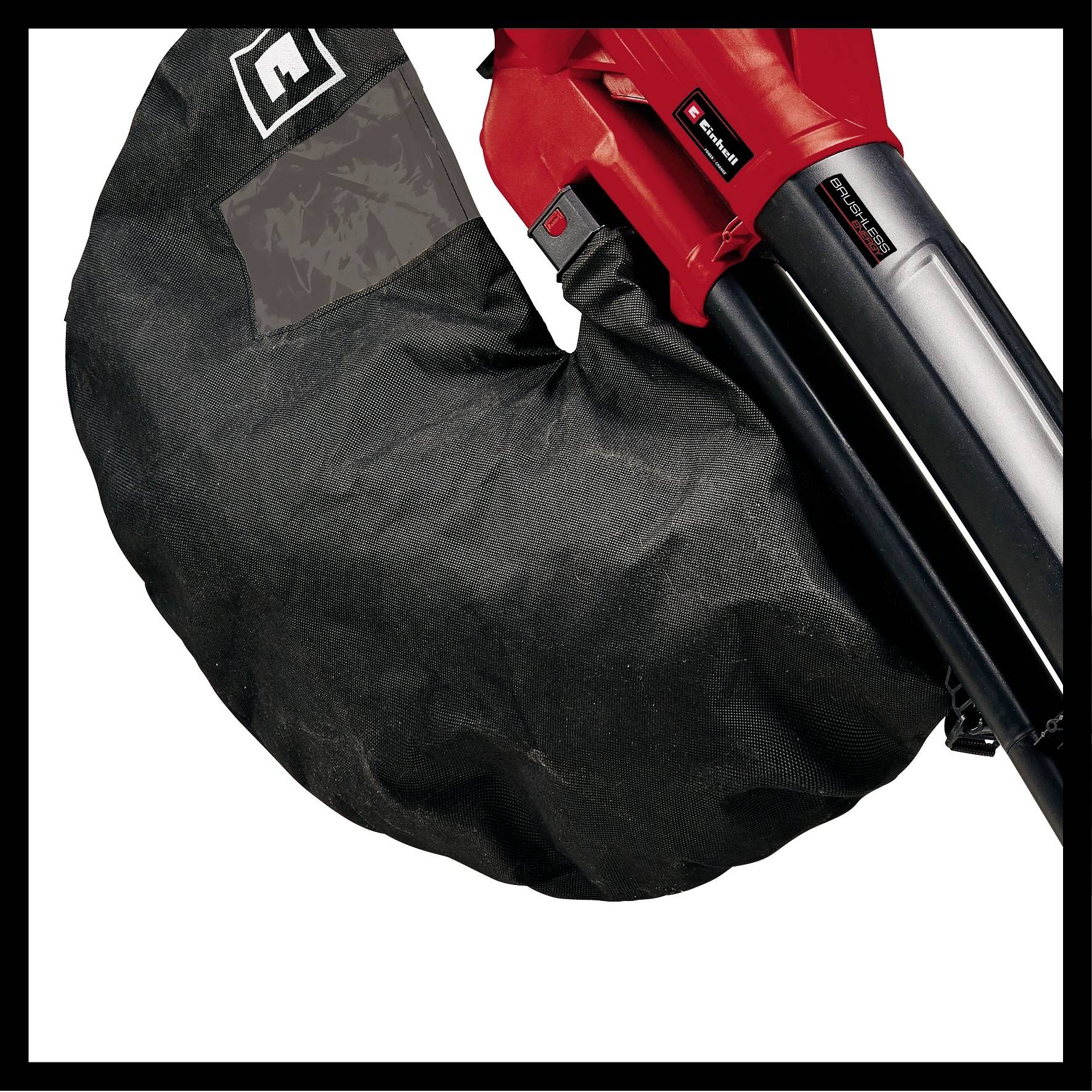 Einhell leaf blower with a red housing and black collection bag, suitable for vacuuming leaves.
