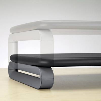 A modern coffee table with a curved, rectangular design and a two-tone surface made of light and dark grey material.