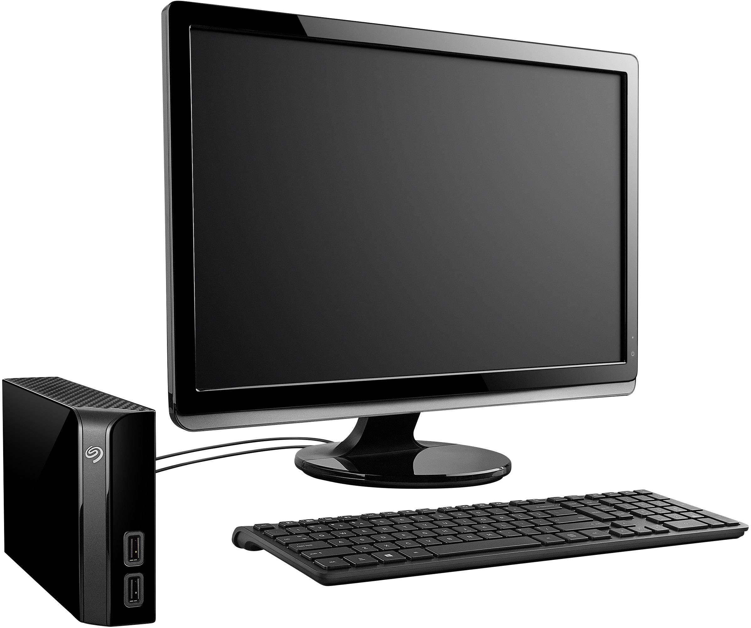 A desktop computer with a monitor, keyboard and external hard drive, which are interconnected.