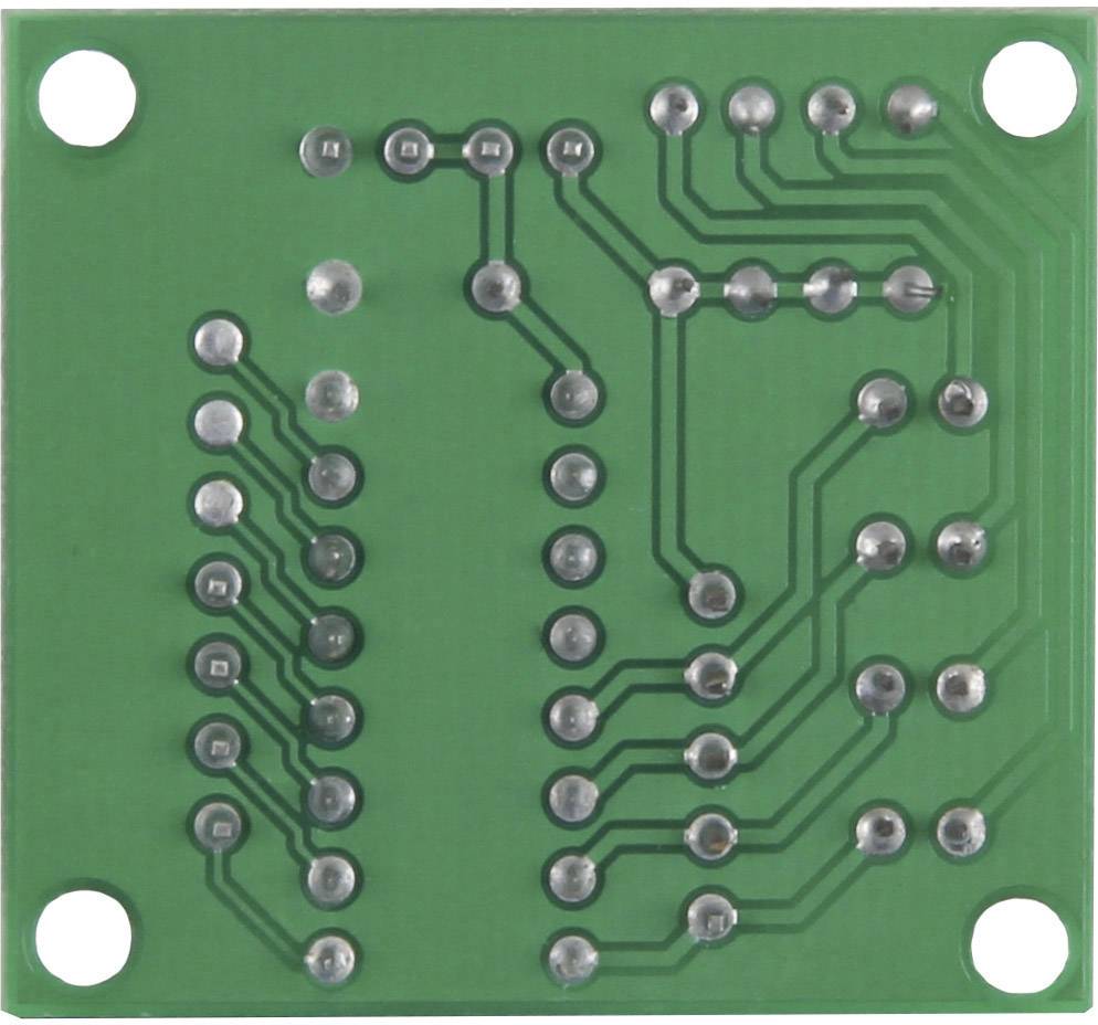 Green printed circuit board with visible copper traces and solder points, square in shape, with four screw holes in the corners.