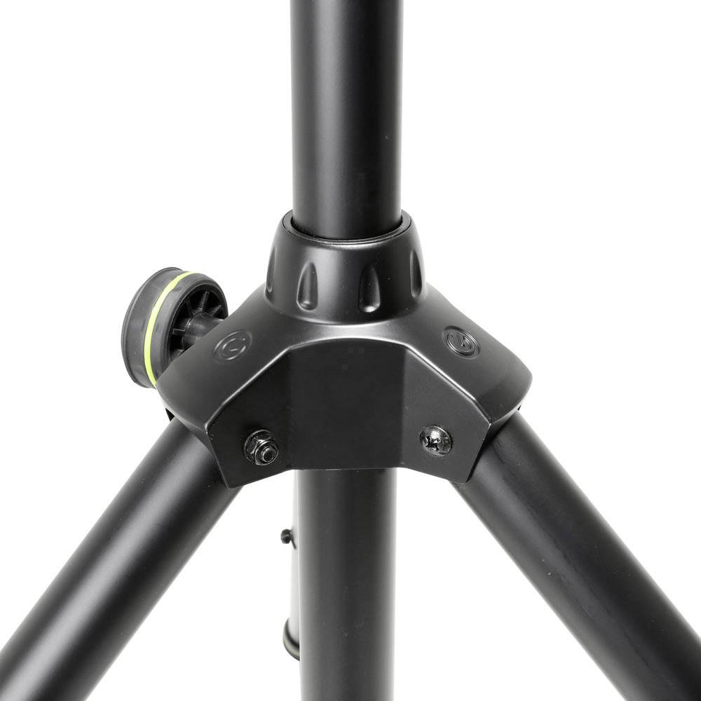A stable tripod in close-up, showing the central column and legs. It has an adjustment screw for height modification.