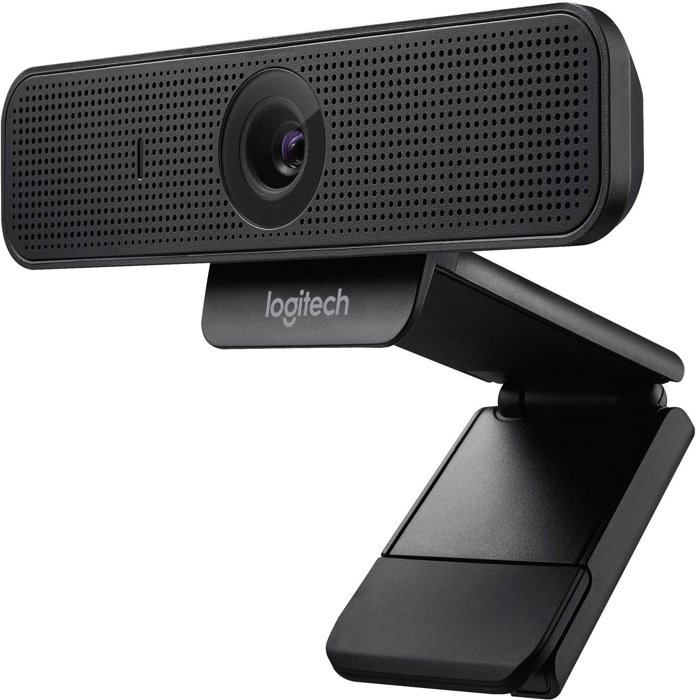 A black webcam with a tripod arm branded 'Logitech'. Camera lens positioned in the centre. Suitable for video calls.