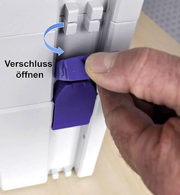 A person opens a fastening on a device, slides a purple lever upwards in the direction of the arrow. Text: 'Open lock'.